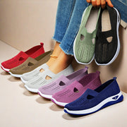 Colorful slip-on shoes displayed with a person wearing them on a neutral background