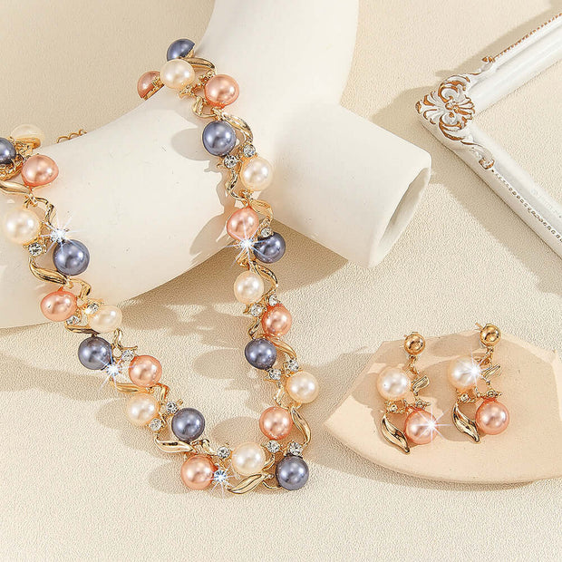 Pearl necklace and earrings set on a beige background