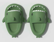 Fun cartoon shark slippers for adults, soft and comfortable for indoor or outdoor wear.