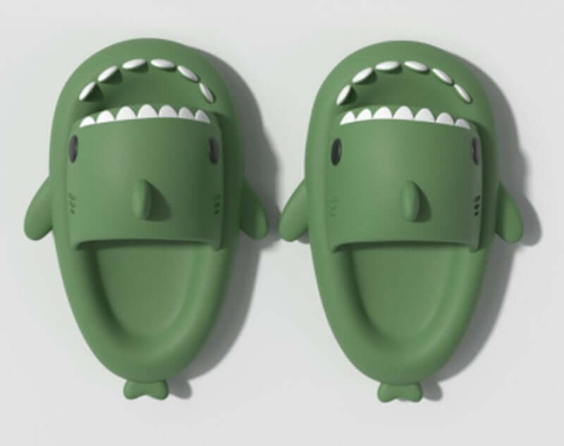 Fun cartoon shark slippers for adults, soft and comfortable for indoor or outdoor wear.