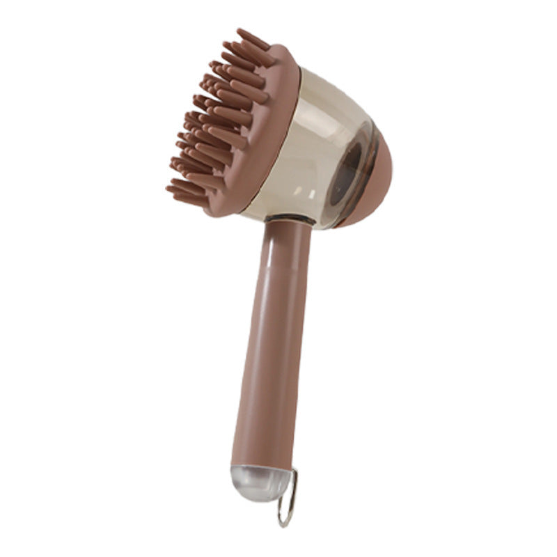 Brown handheld hair dryer with brush attachment on a white background