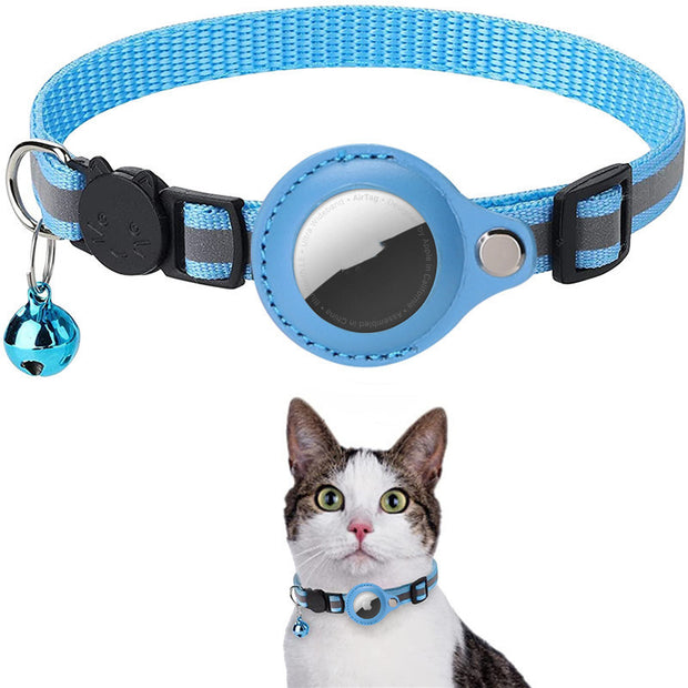 Blue pet collar with bell and cat wearing it on a white background