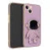 Phone case with a purple astronaut design on a black background
