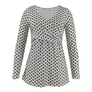Long-sleeve top with black pattern on a white background