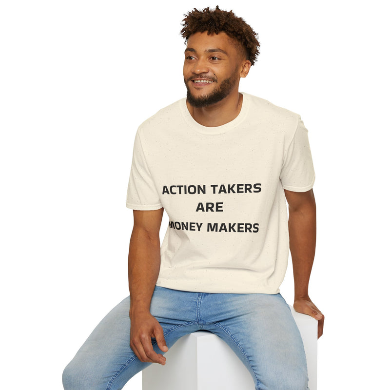 Man wearing a cream t-shirt with text sitting on a white stool against a white background