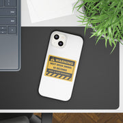 Phone case with a warning design on a desk next to a laptop and plant