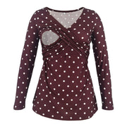 Maroon long-sleeve top with white polka dots on a white background
