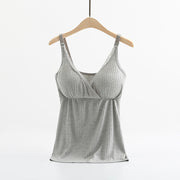 Gray ribbed tank top on a wooden hanger against a white background