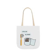 White tote bag with cartoon designs and text on a white background
