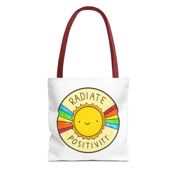 Tote bag with a sun design and 'Radiate Positivity' text on a white background