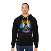 Man wearing a black hoodie with Batman graphic design on a white background