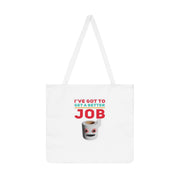 White tote bag with humorous text and cartoon character on a white background