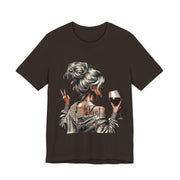 Black t-shirt with a graphic of a woman holding a glass of wine on a white background
