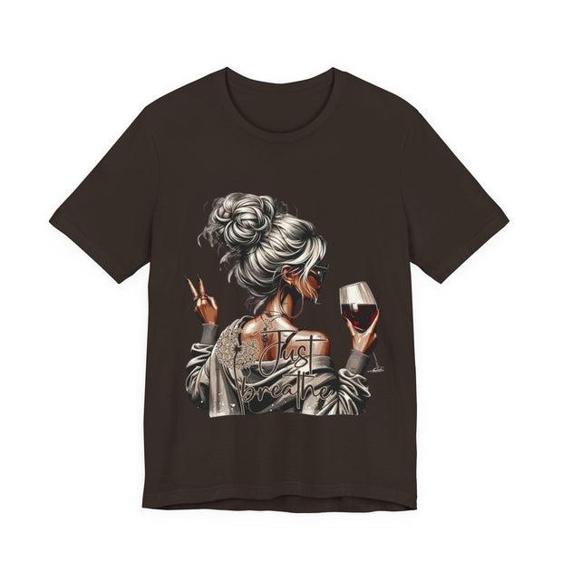 Black t-shirt with a graphic of a woman holding a glass of wine on a white background