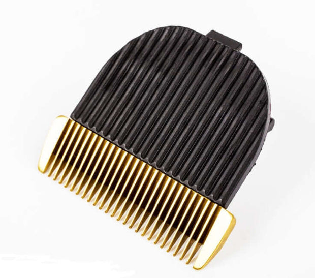 Ceramic cutter head of a dog hair clipper featuring sharp golden teeth for precise grooming.