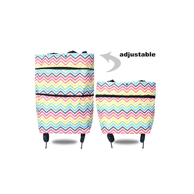 Two colorful striped bags with wheels and an adjustable strap on a white background.