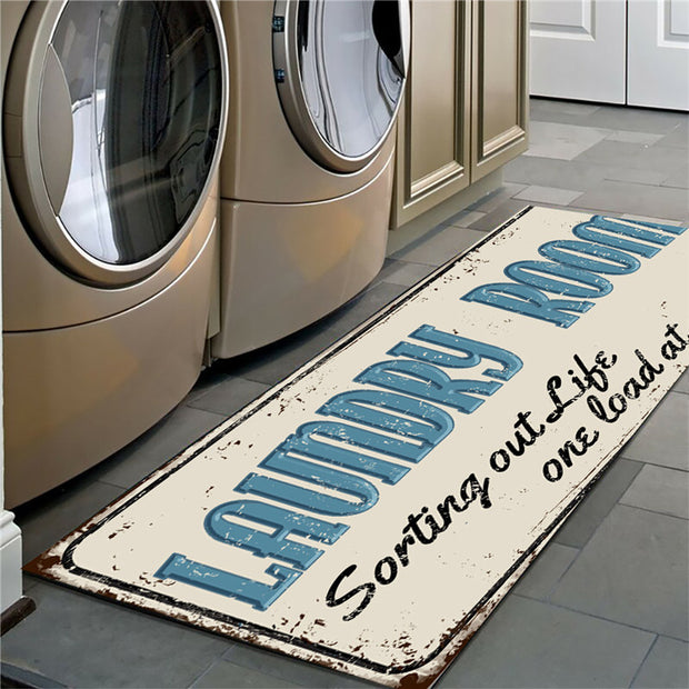 Laundry room mat with text in front of washing machines