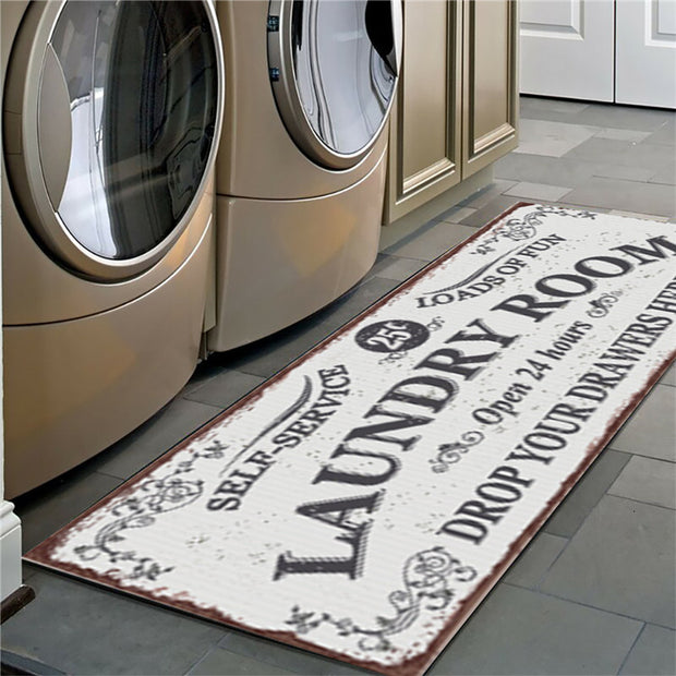 Laundry room rug with decorative text in front of washing machines