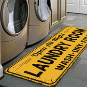 Laundry room mat with text in front of washing machines
