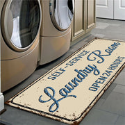Laundry room with a vintage-style mat reading 'Self-Service Laundry Room Open 24 Hours'.