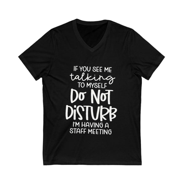 Black t-shirt with white text on a white background