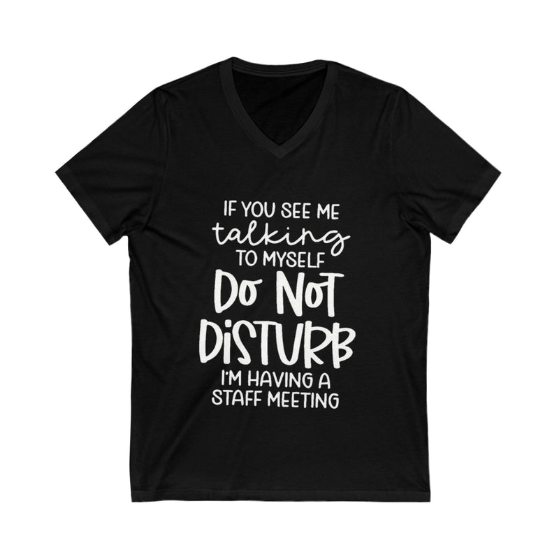 Black t-shirt with white text on a white background