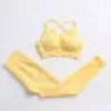 yellow women's yoga 3 pc set on a white background