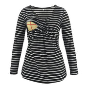 Black and white striped long-sleeve top with a geometric design on a white background