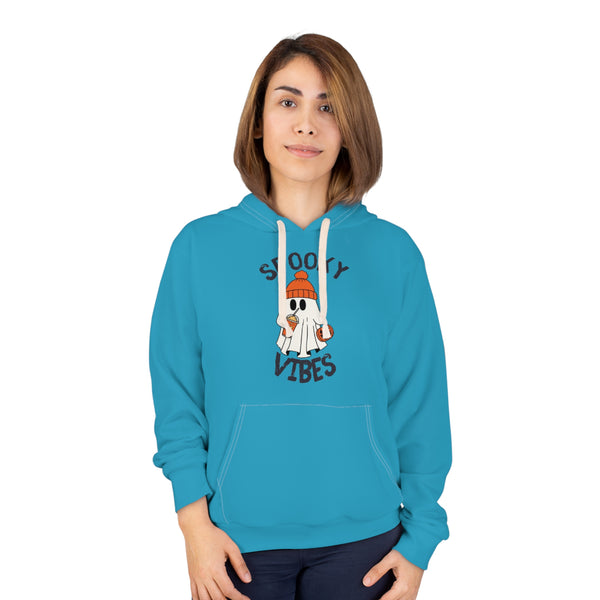 woman wearing a blue hoodie with a ghost graphic and text on a white background
