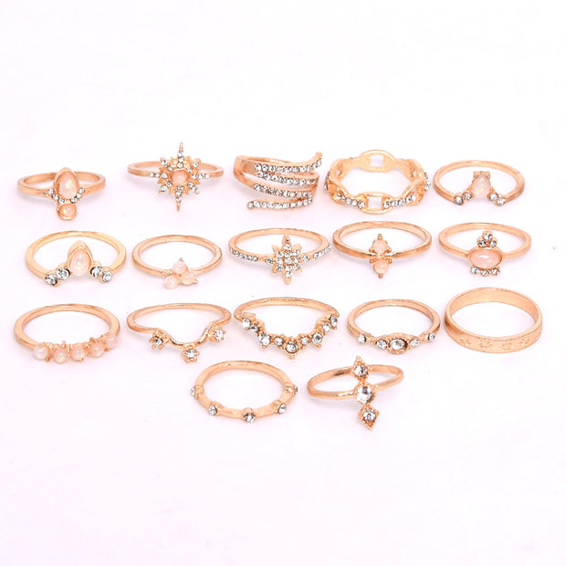 Set of rose gold rings on a white background