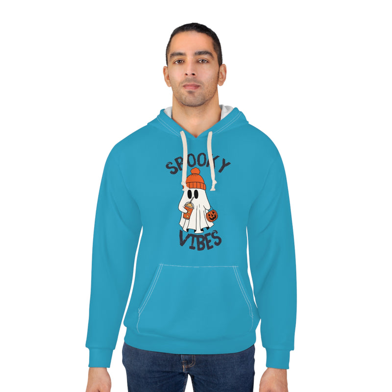 Man wearing a blue hoodie with a ghost graphic and text on a white background