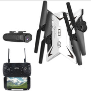 White drone with black propellers and a remote control with screen on a white background
