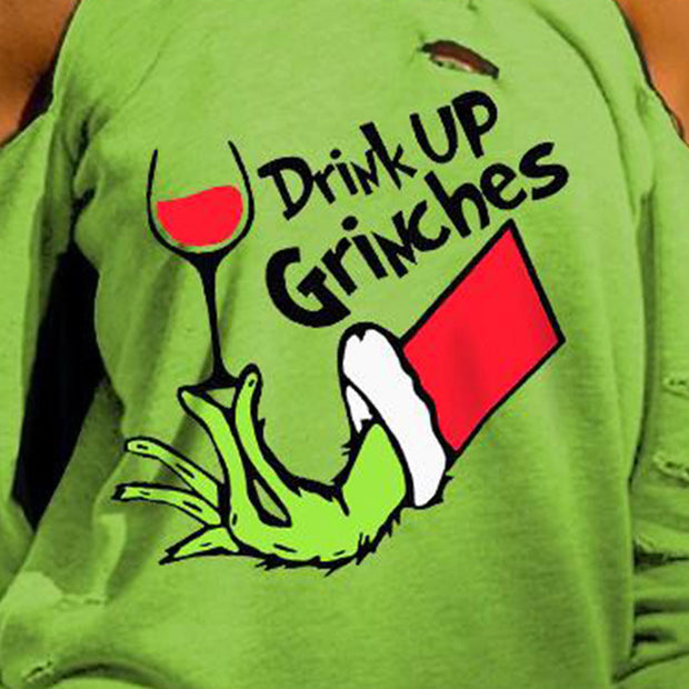Green sweatshirt with Grinch hand holding a wine glass and text 'Drink Up Grinches' on a green background.