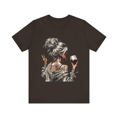 Black t-shirt with a graphic design of a woman holding a glass of wine on a white background