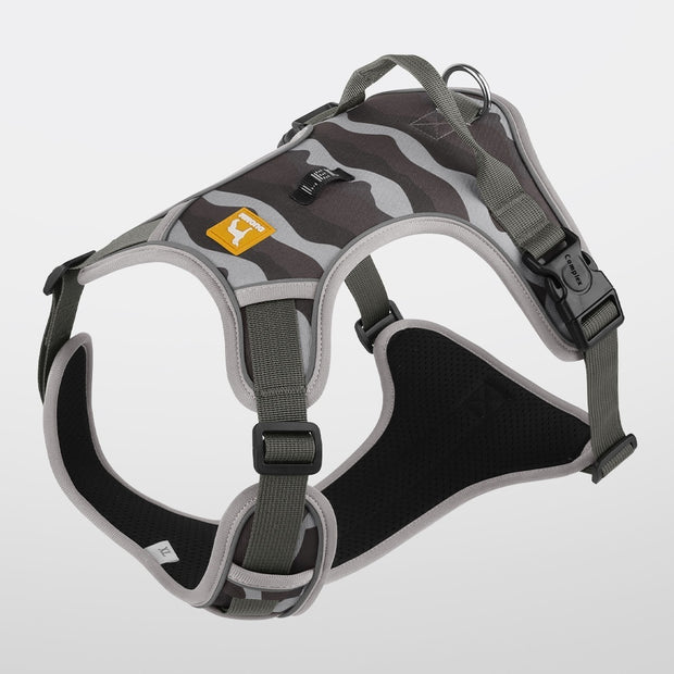 Dog harness with camouflage pattern on a light gray background