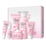 Japan Sakura skincare product set with various bottles and containers on a white background