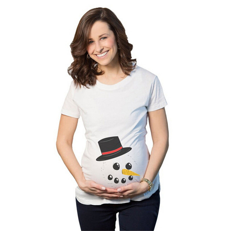 Pregnant woman wearing a white t-shirt with a snowman design on a white background