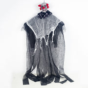 Hanging clown decoration with a white sheet draped over it on a white background
