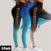 Three pairs of leggings with cut-out designs in black, blue, and gray on a light background.
