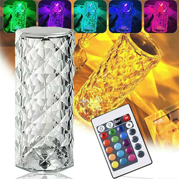 Crystal-like lamp with colorful LED lights and remote control on a bright background
