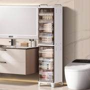 Tall white storage cabinet with transparent doors in a bathroom setting.