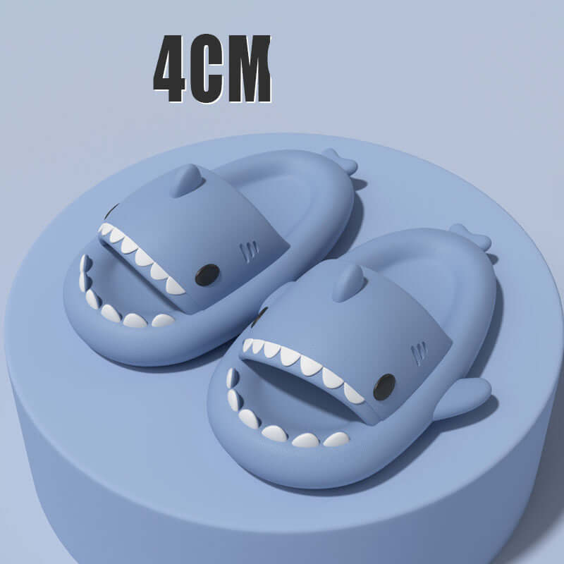 Cartoon shark slippers for adults, featuring cute design and 4cm height on a blue background.