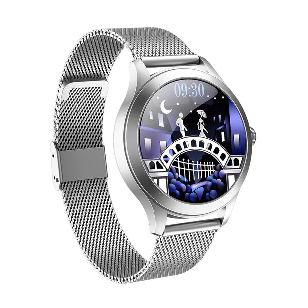 Silver smartwatch with a detailed display on a white background