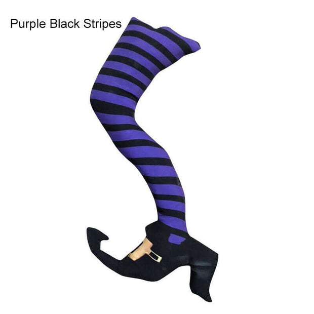 Purple and black striped tights with a witch boot on a white background