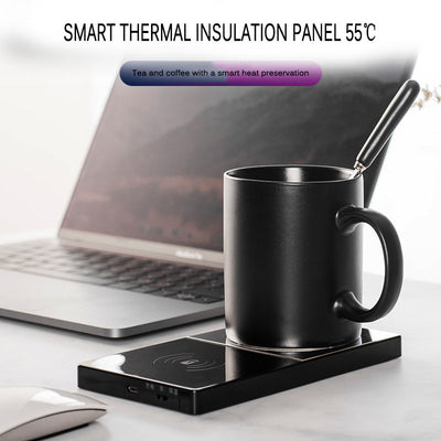 Black mug on a smart thermal insulation panel with a laptop in the background