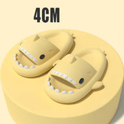 Yellow cartoon shark slippers on a yellow base, featuring a 4cm height, perfect for fun indoor or outdoor wear.