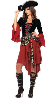 Woman in a pirate costume with a red and black dress, hat, and boots on a white background