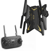 Black and gold drone with remote control on a white background