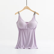 Lavender satin nightgown on a hanger against a white background