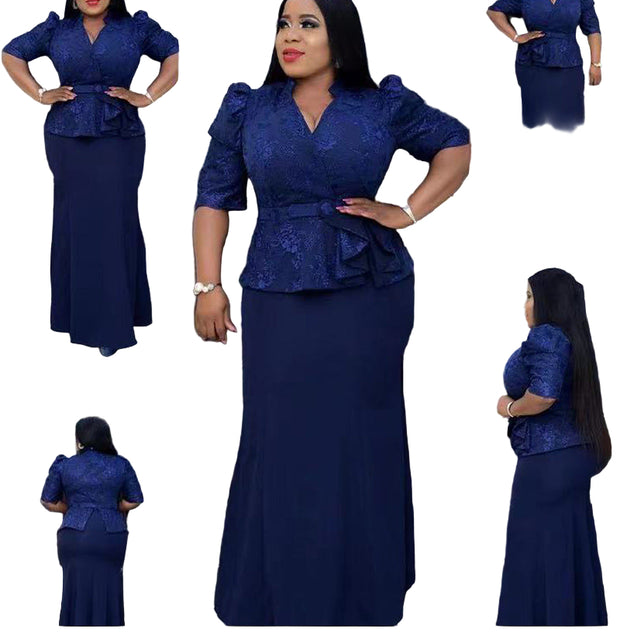 Woman wearing a blue outfit with ruffled top and long skirt on a white background